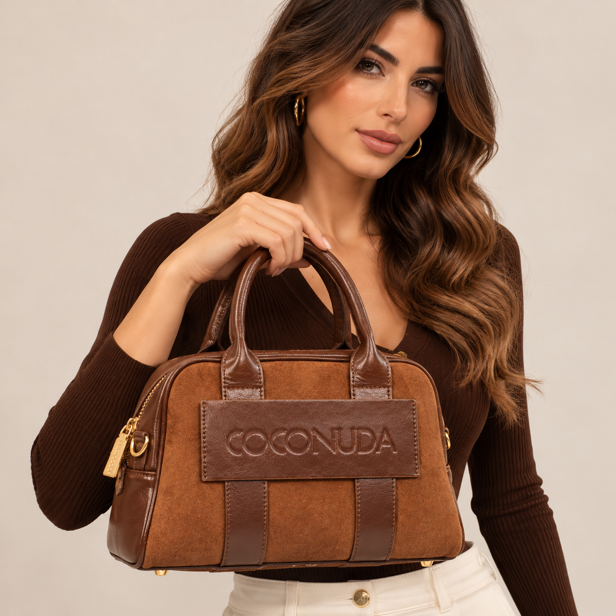 Bauletto Coconuda Cognac, tenuto a mano