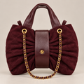 Flake Bag Borgogna - vista frontale con catena e placca dorata