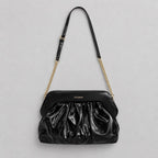 Coconuda Clutch Pouch Nero - appesa con tracolla, vista frontale