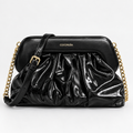 Coconuda Clutch Pouch Nero - vista frontale con tracolla e catena dorata