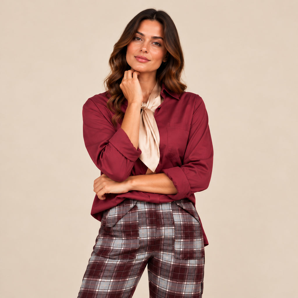 Dettaglio della vita alta e delle tasche frontali del pantalone Highland tartan